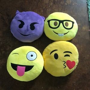 Four emoji pillows